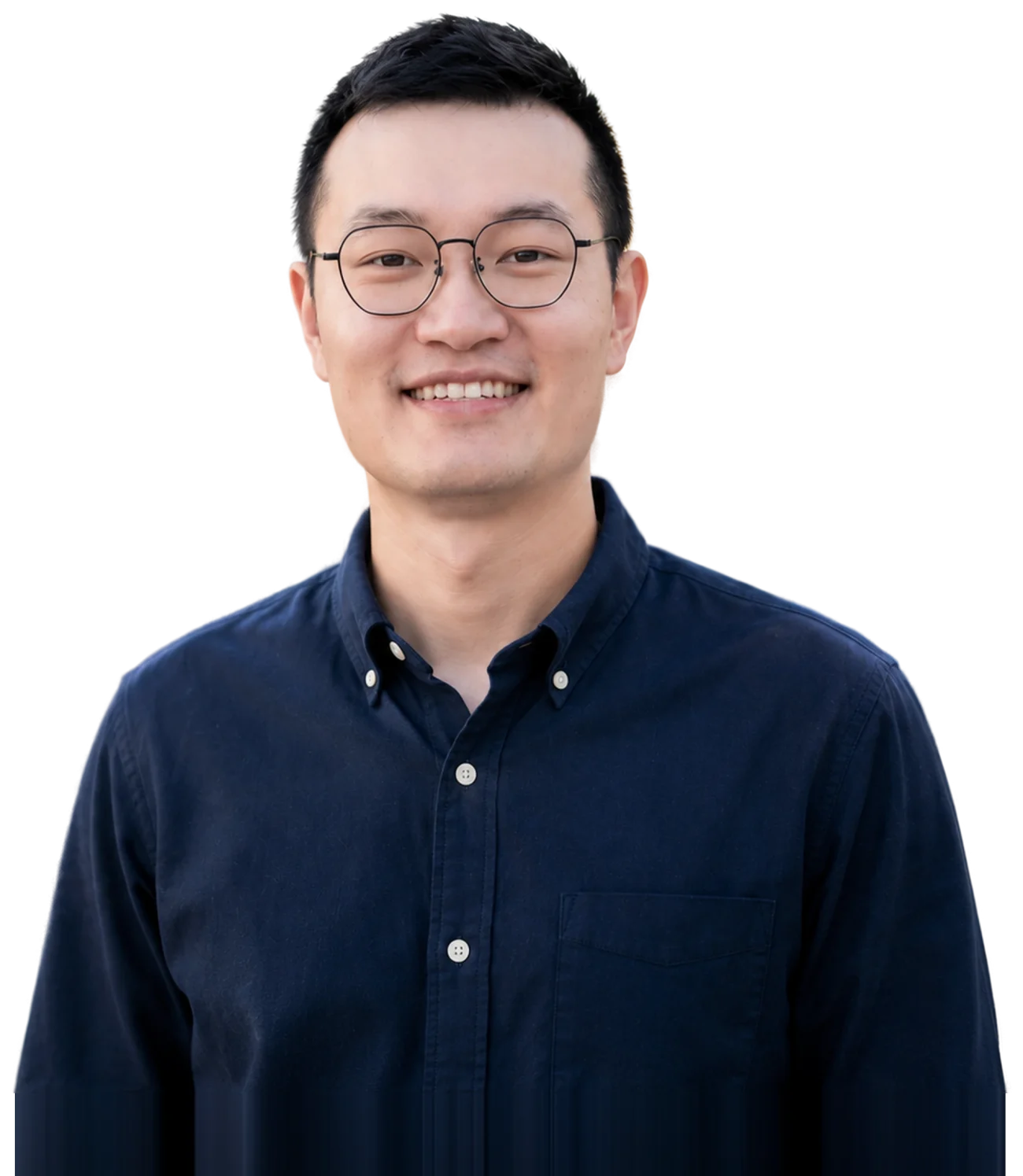 Terence Tao smiling in a navy button-down shirt